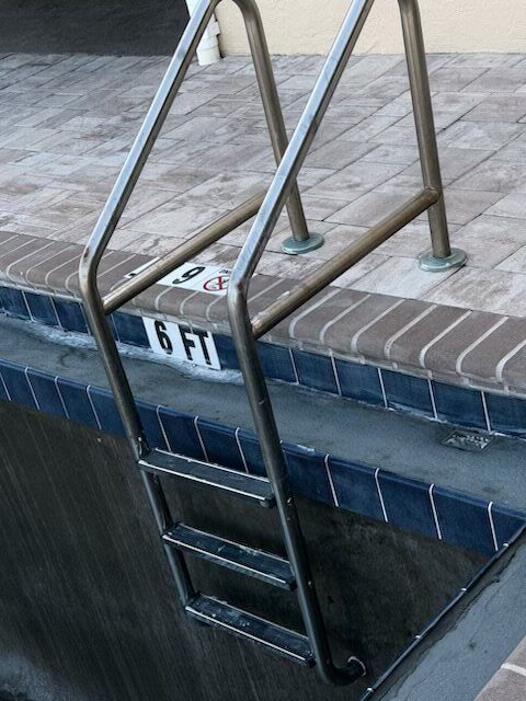 New tile line along the six-foot mark of the West Pool